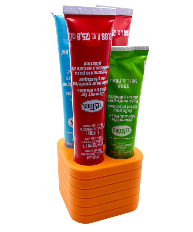 Jeff Did It! - Testors Glue / Putty Holder - Holds 4 Cement, Glue, Putty, etc - Anti-Slip Rubber Feet - 3D Printed - Made in the USA
